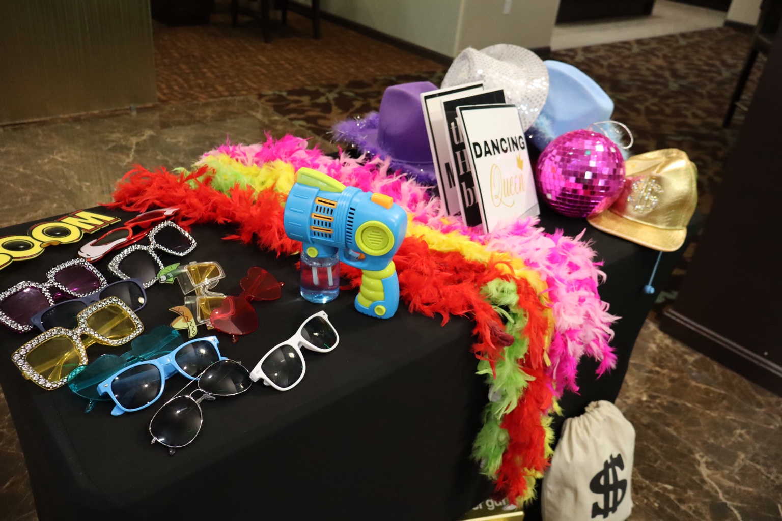 Colorful Photo Booth props included for guests